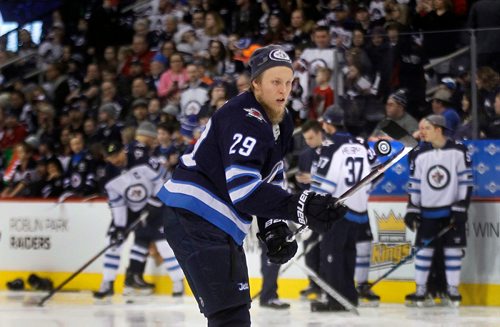 PHIL HOSSACK / WINNIPEG FREE PRESS - Patrik Laine didnt wait for the puck control event to flash a little trash in the warm up Wednesday at Bell MTS Place as the Jets showed off their skills for fans in the annual Skills Competition.  See story. February 13, 2018
