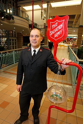 BORIS MINKEVICH / WINNIPEG FREE PRESS  081119 Salvation Army's kettle in Portage Place with Capt. Robert Russell.