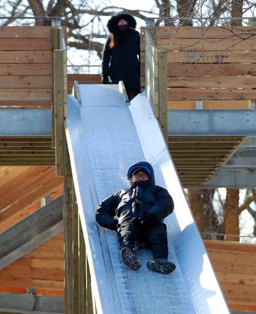 BORIS MINKEVICH / WINNIPEG FREE PRESS
Cae Lee enjoys the new toboggan slides at St. Vital Park. He was there with his friend (who didn't want name used). He moved to near Brandon, MB 2 years ago from South Korea and embraces the cold Winnipeg temps. Feb. 15, 2018