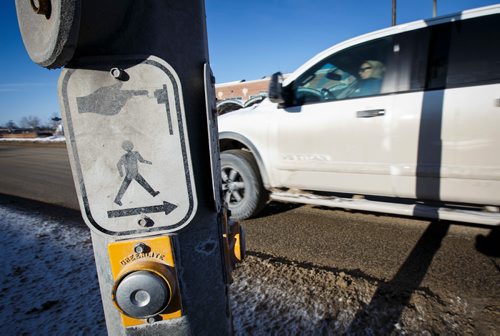 MIKE DEAL / WINNIPEG FREE PRESS
The crosswalk at Notre Dame Ave and Downing Street.
180215 - Thursday, February 15, 2018.