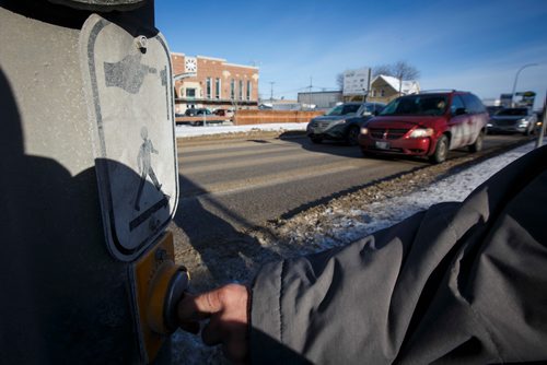 MIKE DEAL / WINNIPEG FREE PRESS
The crosswalk at Notre Dame Ave and Downing Street.
180215 - Thursday, February 15, 2018.