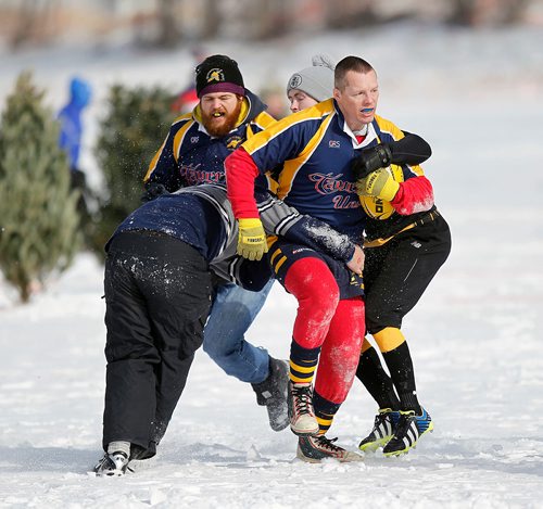 PHIL HOSSACK / WINNIPEG FREE PRESS - Tavern United and the U of M "Herd" met to settle the score on the Red River Saturday afternoon in an all day rugby event that got underway at noon and ran oall afternoon.. STAND-UP.- February 17, 2018