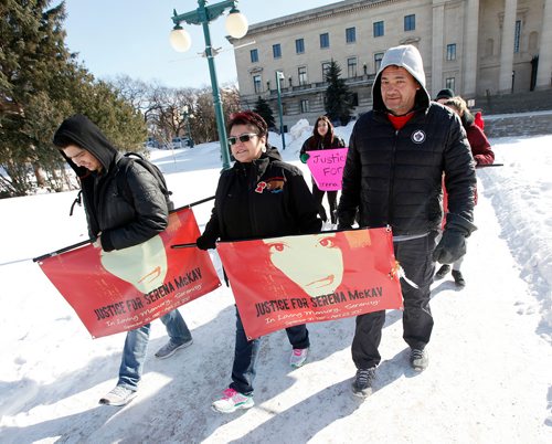 PHIL HOSSACK / WINNIPEG FREE PRESS - A couple of dozen marchers including Serena McKay's mother Delores Daniels (centre) marched from the Legilature Saturday. See Bill Redekop story. - February 17, 2018