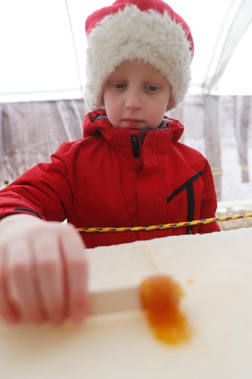 JOHN WOODS / WINNIPEG FREE PRESS
Konnor Maranchuck rolls taffy at the Festival du Voyageur in Winnipeg Sunday, February 18, 2017.