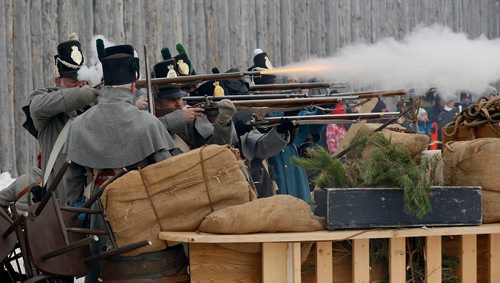 JOHN WOODS / WINNIPEG FREE PRESS
Historical actors perform a Skirmish at The Fort at the Festival du Voyageur in Winnipeg Sunday, February 18, 2017.