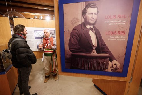 JOHN WOODS / WINNIPEG FREE PRESS
Philippe Mailhot, former director of the St. Boniface Museum, talks to a visitor at the St Boniface Museum in Winnipeg Monday, February 19, 2018. In honour of Louis Riel Day, the Manitoba Metis Federation and Le Musee de Saint-Boniface will be hosting a free Louis Rield Day Celebration.