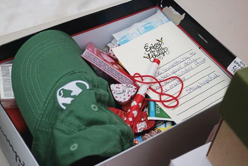 Canstar Community News Feb. 14, 2018 - Volunteers with the Fountain Street Community Cupboard prepared and handed out boxes with gifts for those in need. (LIGIA BRAIDOTTI/CANSTAR/TIMES)