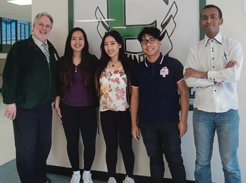 Canstar Community News (From left) Elmwood High School principal Mike Babb, and student council members Kareena Ricafort, Trisha Lubo, Chester Nacalaban, and Zekaria Selahadin are helping organize a pair of fentanyl awareness presentations at the school on Feb. 22. One is for students during class time, the other at 5:30 is free and open to the public. The events are being organized in conjunction with the Chalmers Neighbourhood Renewal Corporation, the Elmwood Community Resource Centre, Winnipeg Crimestoppers, and the Winnipeg Police Service. (SHELDON BIRNIE/CANSTAR/THE HERALD)