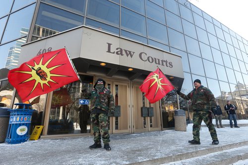 JOHN WOODS / WINNIPEG FREE PRESS
Supporters of Tina Fontaine's family gather outside the law courts as lawyers give final arguments in the 2nd degree murder trial of Raymond Cormier, Fontaine's alleged killer, in Winnipeg Tuesday, February 20, 2018.