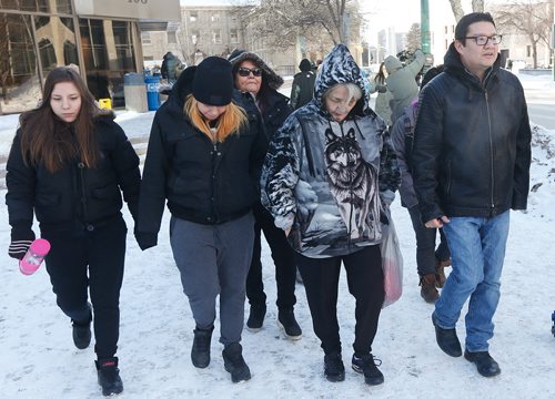 JOHN WOODS / WINNIPEG FREE PRESS
Thelma Favel (2nd from right)), Tina Fontaine's aunt, leaves the law courts with unidentified family members after a day of listening to final arguments in the 2nd degree murder trial of Raymond Cormier, Fontaine's alleged killer, in Winnipeg Tuesday, February 20, 2018.