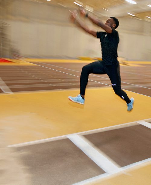 PHIL HOSSACK / WINNIPEG FREE PRESS - Gee-Ef Nkwonta leaps into space Thursday, warming up for a triple Jump event this weekend at the Canada West Track and Field event this weekend. Jeff Hamilton story. - February 20, 2018