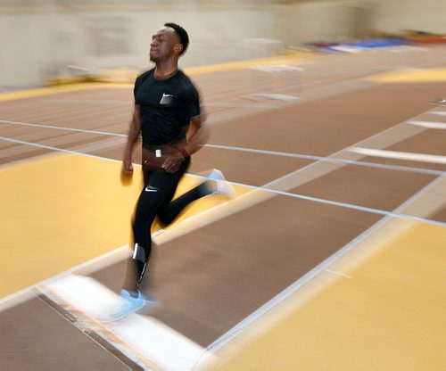 PHIL HOSSACK / WINNIPEG FREE PRESS - Gee-Ef Nkwonta leaps into space Thursday, warming up for a triple Jump event this weekend at the Canada West Track and Field event this weekend. Jeff Hamilton story. - February 20, 2018