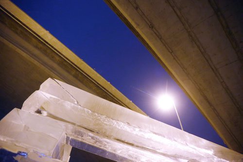 JOHN WOODS / WINNIPEG FREE PRESS
An ice block sculpture sits under the Norwood Bridge and is part of the Warming Hut exhibit on the Red and Assiniboine Rivers in Winnipeg Tuesday, February 20, 2018.