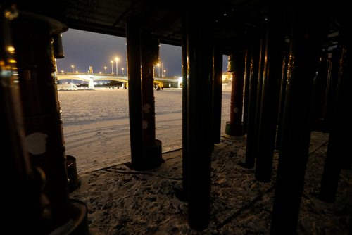 JOHN WOODS / WINNIPEG FREE PRESS
The Norwood Bridge is seen through Temple which is part of the Warming Hut exhibit on the Red and Assiniboine Rivers in Winnipeg Tuesday, February 20, 2018.