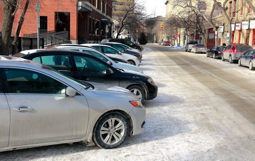 BORIS MINKEVICH / WINNIPEG FREE PRESS
Back-in angle parking on Bannatyne Ave. between Rorie Street and Waterfront Drive. Feb. 21, 2018