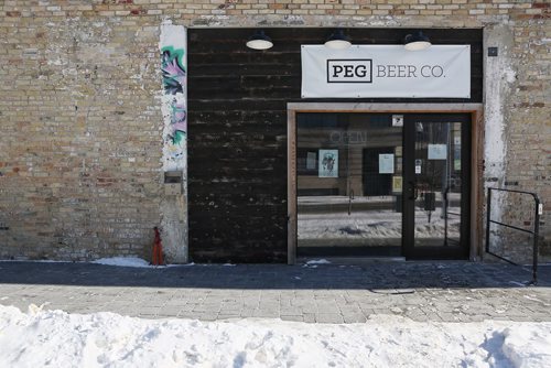 MIKE DEAL / WINNIPEG FREE PRESS
A sign in the door at Peg City Co. announces that it is closed until further notice. The brew pub located at 125 Pacific Ave has seen a drop in service, taps running out of beer and many food items not available. 
180222 - Thursday, February 22, 2018