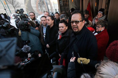 PHIL HOSSACK / WINNIPEG FREE PRESS -  Regional AFN Chief Kevin Hart (beard) talks to  the media outside the Winnipeg Courthouse Thursday after Raymond Cormier was found not guilty in the murder of Tina Fontaine. See story.  - February 22, 2018