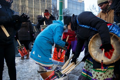 MIKE DEAL / WINNIPEG FREE PRESS
People gather in front of the Law Courts building to prepare for the Walk in honour of Tina Fontaine which ended at The Forks where Fontaine's great-aunt Thelma Favel spoke to a few hundred people.
180223 - Friday, February 23, 2018.