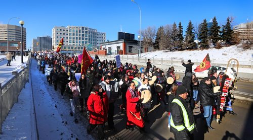 RUTH BONNEVILLE / WINNIPEG FREE PRESS

Hundreds of people march from the Law Courts to the the Forks holding signs  in support of Tina Fontaine's family members after a not guilty verdict was issued to Tina's accused killer, Raymond Cormier, Thursday.  

February 23, 2018