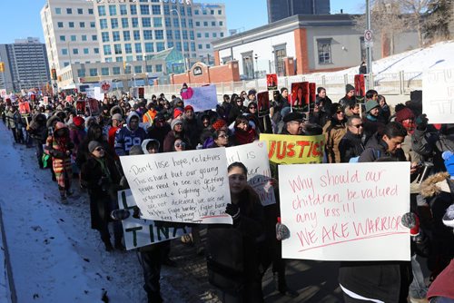 RUTH BONNEVILLE / WINNIPEG FREE PRESS

Hundreds of people march from the Law Courts to the the Forks holding signs  in support of Tina Fontaine's family members after a not guilty verdict was issued to Tina's accused killer, Raymond Cormier, Thursday.  

February 23, 2018