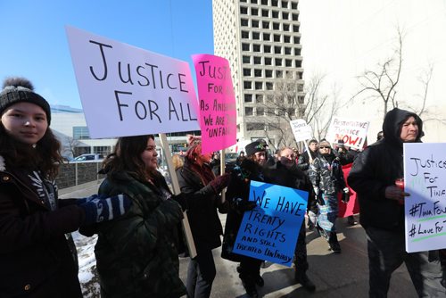 RUTH BONNEVILLE / WINNIPEG FREE PRESS

Hundreds of people march from the Law Courts to the the Forks holding signs  in support of Tina Fontaine's family members after a not guilty verdict was issued to Tina's accused killer, Raymond Cormier, Thursday.  

February 23, 2018