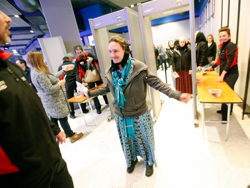 PHIL HOSSACK / WINNIPEG FREE PRESS - Tirzah Maendel submits to security before entering a Winnipeg Jets game in December.  -See Melissa Martin's story.  - February 23, 2018