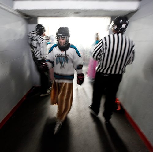 PHIL HOSSACK / WINNIPEG FREE PRESS - Anya Wurtz heads back to the dressing room for some last minute adjustments before their game at the MacGregor arena. See Melissa Martin's story. February 23, 2018