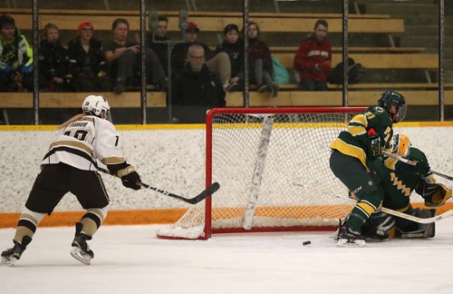 TREVOR HAGAN / WINNIPEG FREE PRESS
Manitoba Bisons, Mekaela Fisher (19) grabs a rebound and fires it into the open net while playing the Alberta Pandas, Friday, February 23, 2018.