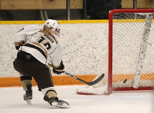 TREVOR HAGAN / WINNIPEG FREE PRESS
Manitoba Bisons, Mekaela Fisher (19) grabs a rebound and fires it into the open net while playing the Alberta Pandas, Friday, February 23, 2018.