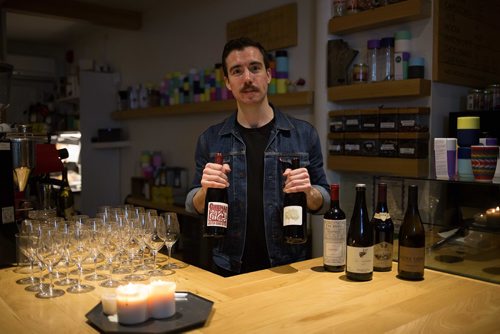 JEN DOERKSEN/WINNIPEG FREE PRESS

Peter Hill of Endive natural wine bar shows some of the wines for the event at Cafe Postal. Friday, February 23, 2018.