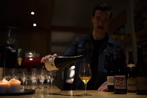 JEN DOERKSEN/WINNIPEG FREE PRESS

Peter Hill of Endive natural pours wine featured at his pop-up bar event at Cafe Postal. Friday, February 23, 2018.