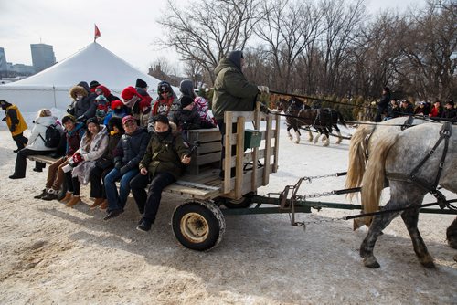 MIKE DEAL / WINNIPEG FREE PRESS
Festival goers enjoy a sleigh ride during the last weekend at the Festival du Voyageur in Fort Gibraltar.
180224 - Saturday, February 24, 2018.