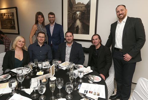 JASON HALSTEAD / WINNIPEG FREE PRESS

Standing, from left, Sheri Pelletier, Marcus Phlug and Real Pelletier, and front, from left, Jennifer Corda, Mario Bilodeau, Tony Russo-Introito and Helo Rodrigues enjoy themselves at the RBC table at the Deer Lodge Foundations Bella Notte fundraising dinner on Feb. 9, 2018 at De Luca's Banquet Centre. (See Social Page)