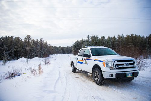 MIKAELA MACKENZIE / WINNIPEG FREE PRESS
An RCMP truck blocks the entrance to the dump, where an abandoned vehicle was found on the Chemawawin First Nation Reserve, Manitoba on Sunday, Feb. 25, 2018. The last known individual to have driven the car, a 30-year-old male from Easterville, was discovered deceased, and the RCMP is investigating this as a homicide.
180225 - Sunday, February 25, 2018.