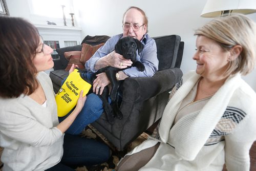 JOHN WOODS / WINNIPEG FREE PRESS
Jim Gauthier holds Joycie, future guide dog, as her foster mom Lorraine Rempel, left, and Canadian National Institute for the Blind (CNIB) rep Margot Ross looks on in Rempel's home Monday, February 26, 2018. Joycie, who is named after Gauthier's late wife, arrived in Canada last week from a breeder in Australia, along with her sister Lulu. The two pups are the first guide dogs the CNIB will train here in Winnipeg with Gauthier's financial support. 


