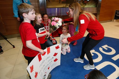 JOHN WOODS / WINNIPEG FREE PRESS
Children greet Kaitlyn Lawes of Winnipeg, gold in mixed doubles curling, as she arrives home from the winter olympics Monday, February 26, 2018.