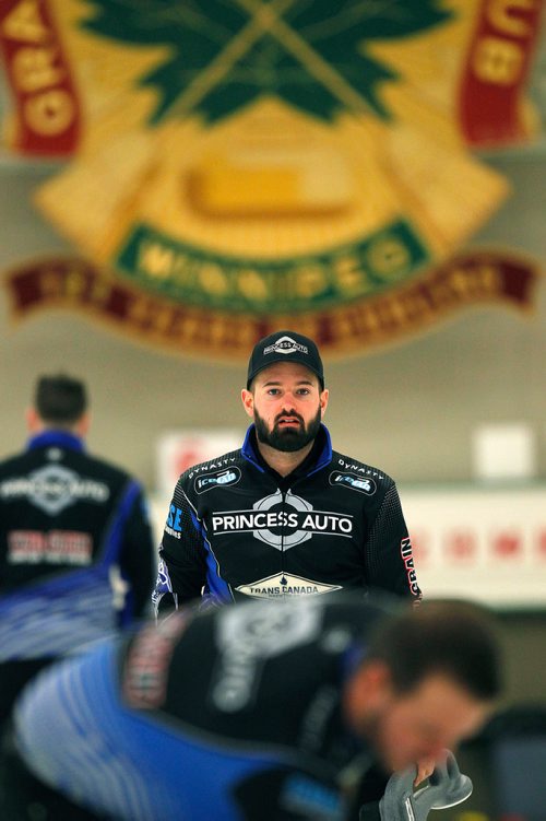 PHIL HOSSACK / WINNIPEG FREE PRESS -  TEAM CARRUTHERS - Ried Carruthers watches team mates sweep down ice during a practice session at the Granit CC Tuesday afternoon. See Jay Bell's story.  - February 27, 2018