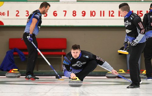 PHIL HOSSACK / WINNIPEG FREE PRESS -  TEAM CARRUTHERS - Carruthers Third, Braeden Moskowy delivers between Derek Samagalski and Colin Hodgson at a practice session at the Granit CC Tuesday afternoon. See Jay Bell's story.  - February 27, 2018