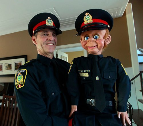 BORIS MINKEVICH / WINNIPEG FREE PRESS
Police officer Dave Dixon and his dummy Sgt. Willie are retiring this week. Dixon and his dummy ran public education programs in public schools in the early 2000s. Hes retiring and the dummy is going into the Wpg Police Museum on Friday. BILL REDEKOP STORY. Feb. 27, 2018