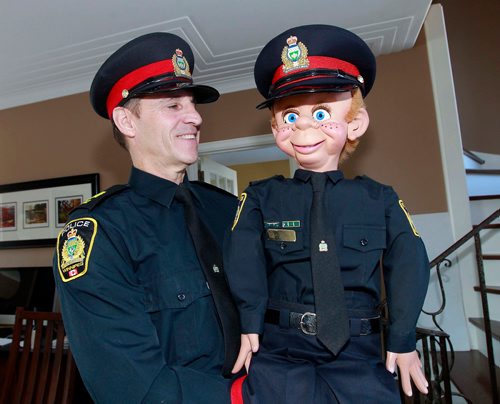 BORIS MINKEVICH / WINNIPEG FREE PRESS
Police officer Dave Dixon and his dummy Sgt. Willie are retiring this week. Dixon and his dummy ran public education programs in public schools in the early 2000s. Hes retiring and the dummy is going into the Wpg Police Museum on Friday. BILL REDEKOP STORY. Feb. 27, 2018