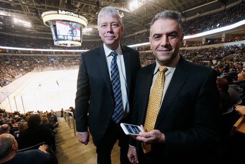JOHN WOODS / WINNIPEG FREE PRESS
True North Sports and Entertainment (TNSE) chief operating officer John Olfert , left, and Emotion Media president Kamal Leslie are photographed Tuesday, February 27, 2018. Emotion Media has developed, Fannex, an interactive app for fans in large sporting events that allows fans to play contests, get marketing info and, as well, when fans log in, their phones become pixels in arena-wide light shows and images. TNSE is becoming an equity partner with the Winnipeg tech company.
