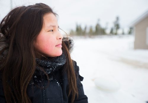 MIKAELA MACKENZIE / WINNIPEG FREE PRESS
Destiny Captain, 11, plays in the snow on the Chemawawin First Nation Reserve, Manitoba on Saturday, Feb. 24, 2018. 
180224 - Saturday, February 24, 2018.