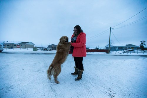 MIKAELA MACKENZIE / WINNIPEG FREE PRESS
Manitoba Underdogs Association executive director Jessica Hansen plays with a dog while going out into the community to convince people to bring their animals into the dog spay and neuter clinic on the Chemawawin First Nation Reserve, Manitoba on Saturday, Feb. 24, 2018. Many Northern Manitoban communities have problems with stray dog overpopulation, and initiatives like these aim to reduce their numbers in a humane way while increasing the quality of life for dogs and humans.
180224 - Saturday, February 24, 2018.