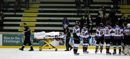 PHIL HOSSACK / WINNIPEG FREE PRESS -After a hit by St Paul Crusader #9 Michael O'Shea left Sturgeon Heights Huskie #14 Cayden Onagi unconcious he was transported to hospital. See Mike Sawatzky's story.   - February 28, 2018
