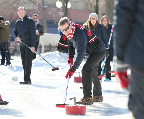 RUTH BONNEVILLE / WINNIPEG FREE PRESS

Winnipeg Mayor Brian Bowman amassed some of the greatest curling talent in Manitoba to compete against representatives of the Exchange District Biz in a fun curling match celebrating winters increasing coolness, Canadas Olympic and burgeoning athletic talent at Old Market Square Thursday.  

 Jeff Stoughton, (Team Canada mixed doubles coach) along with other curlers and members of the Exchange District Biz.

Standup photos 
March 01,18
