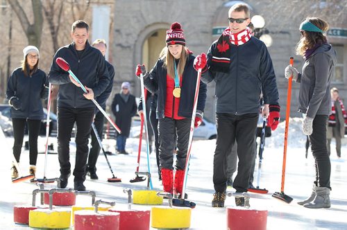 RUTH BONNEVILLE / WINNIPEG FREE PRESS

Winnipeg Mayor Brian Bowman amassed some of the greatest curling talent in Manitoba to compete against representatives of the Exchange District Biz in a fun curling match celebrating winters increasing coolness, Canadas Olympic and burgeoning athletic talent at Old Market Square Thursday.  

Winnipeg Mayor Brian Bowman curls with Kaitlyn Lawes Olympic gold medalist and Jeff Stoughton Team Canada mixed doubles coach along with other curlers and members of the Exchange District Biz in Old Market Square Thursday.  

Standup photos 
March 01,18
