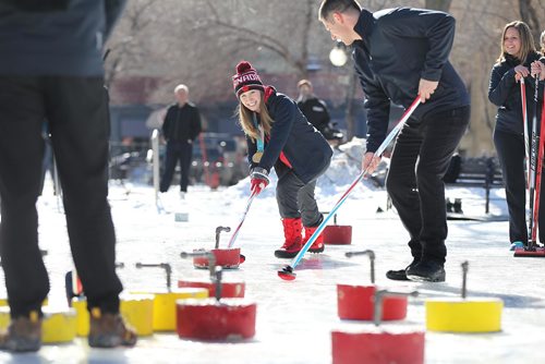 RUTH BONNEVILLE / WINNIPEG FREE PRESS

Winnipeg Mayor Brian Bowman amassed some of the greatest curling talent in Manitoba to compete against representatives of the Exchange District Biz in a fun curling match celebrating winters increasing coolness, Canadas Olympic and burgeoning athletic talent at Old Market Square Thursday.  
Photo of Winnipeg Mayor Brian Bowman with  Kaitlyn Lawes Olympic gold medalist along with other curlers and members of the Exchange District Biz in Old Market Square Thursday.  

Standup photos 
March 01,18