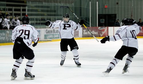 PHIL HOSSACK / WINNIPEG FREE PRESS - St Paul's Crusaders #12 Michael Lee celbrates after scoring against the Sturgeon Heights Huskies Thursday evening as the two teams played out the last game of a WHSHL final.  See Mike Sawatzky's story.   - March 1, 2018