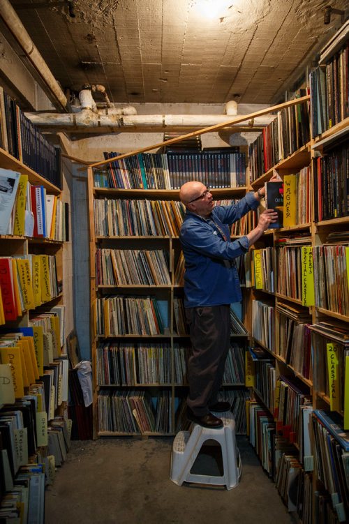 MIKE DEAL / WINNIPEG FREE PRESS
Walter Nykolyszyn, volunteer, pulls out a record in the Manitoba Chamber Orchestra's Vinyl Vault in the basement of the Power Building on Portage Ave. where volunteers open the doors once a month, and record collectors pour in, looking for treasures among the 7,000 or so titles on the shelves. The money from the sales of the records goes towards funding the Manitoba Chamber Orchestra and it's community outreach programs.
180224 - Saturday, February 24, 2018.