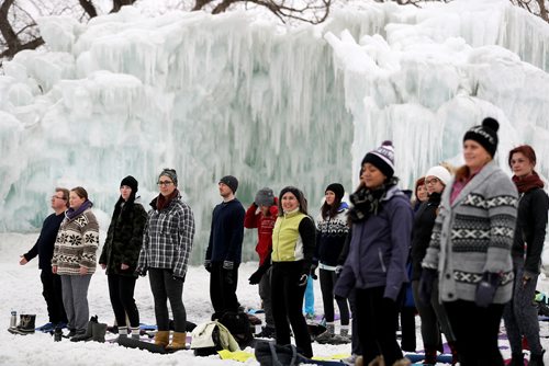 TREVOR HAGAN / WINNIPEG FREE PRESS
A yoga class in the Ice Castle at the Parks Canada site at The Forks, Sunday, March 4, 2018.